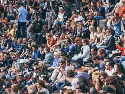 people sitting on stadium