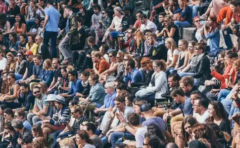 people sitting on stadium